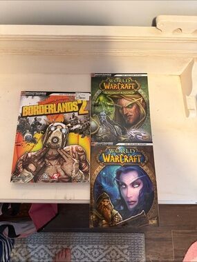 Borderlands 2 & World of Warcraft wow Game Guides Colorful Cover Art bradygames